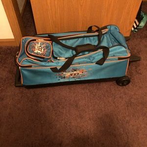 3 ball bowling bag on wheels and 3 balls